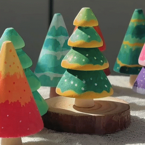 Colorful handcrafted decorative trees made with FunAcrylic hard-tip acrylic markers on a wooden base.
