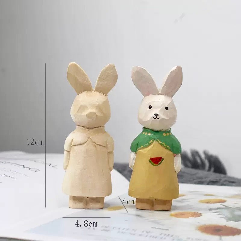 Smooth unfinished natural wood rabbit figure ready for painting or carving projects.