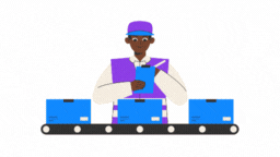A worker in a purple vest inspecting boxes on a conveyor belt