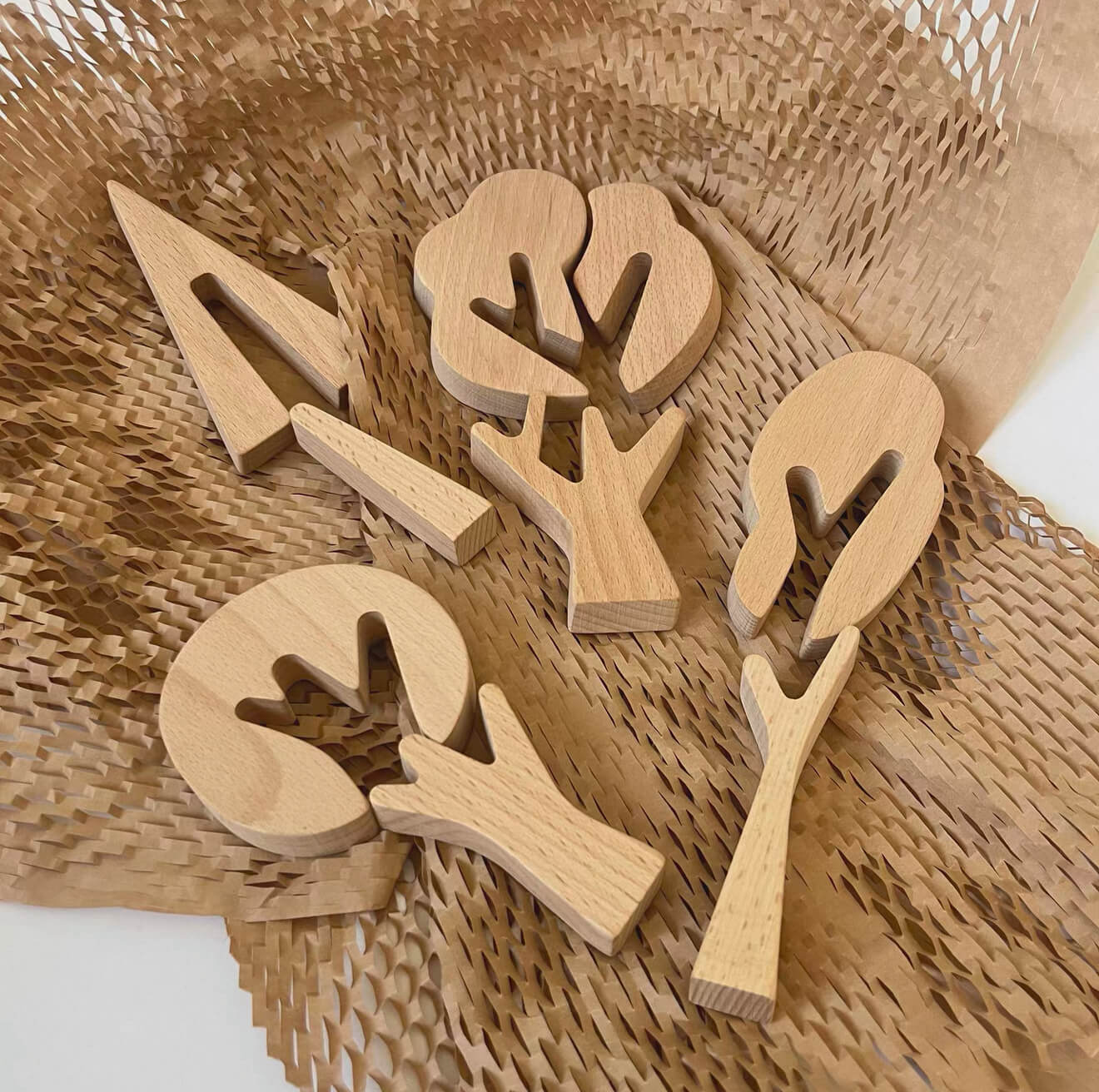 Real unfinished wooden tree shapes before a craft session