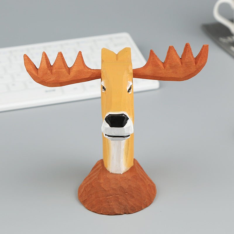 Front view of hand-carved wooden moose eyeglass stand