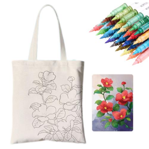 A DIY tote kit featuring a floral design, surrounded by colorful markers and a painted flower artwork.