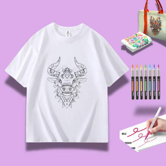 A white t-shirt featuring a detailed doodle of a proud ox, surrounded by art supplies including markers and watercolor paints.