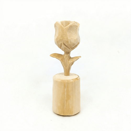 A handcrafted wooden rose flower decoration on a cylindrical base.