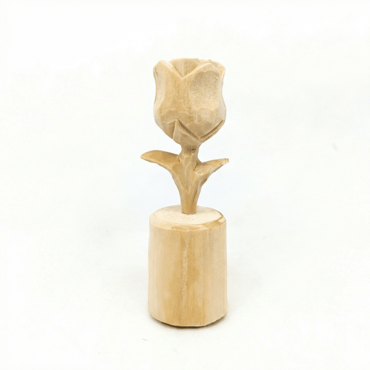A handcrafted wooden rose flower decoration on a cylindrical base.
