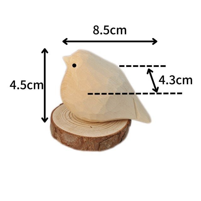 A wooden bird figurine on a circular wooden base, measuring 5cm in height, 8cm in width, and 4cm in depth.