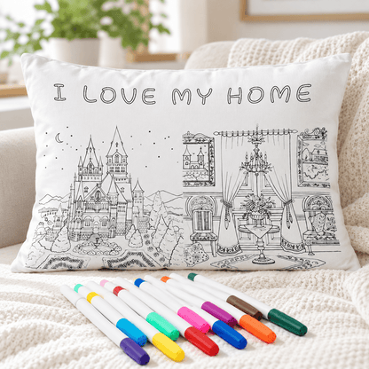 Uncolored castle and home-themed coloring pillowcase displayed with colorful fabric markers
