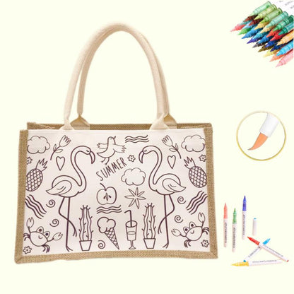 A DIY kit featuring a summer-themed flamingo tote bag with coloring designs and markers.