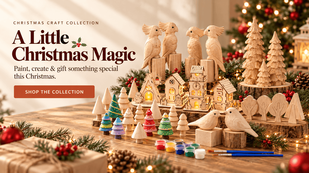 FunAcrylic Christmas craft collection with wooden birds, trees, houses, paints, and brushes
