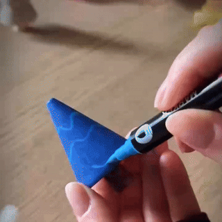 someone use acrylic marker paint on a wooden tree