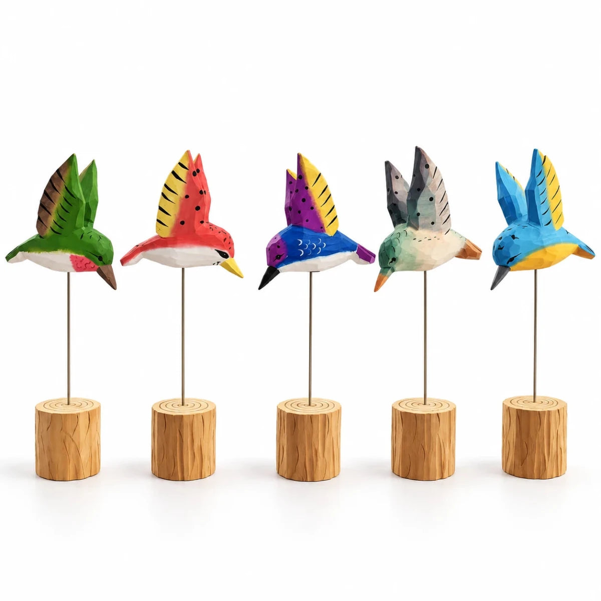 Five colorful hand-carved wooden hummingbird ornaments on wire stands with wood bases