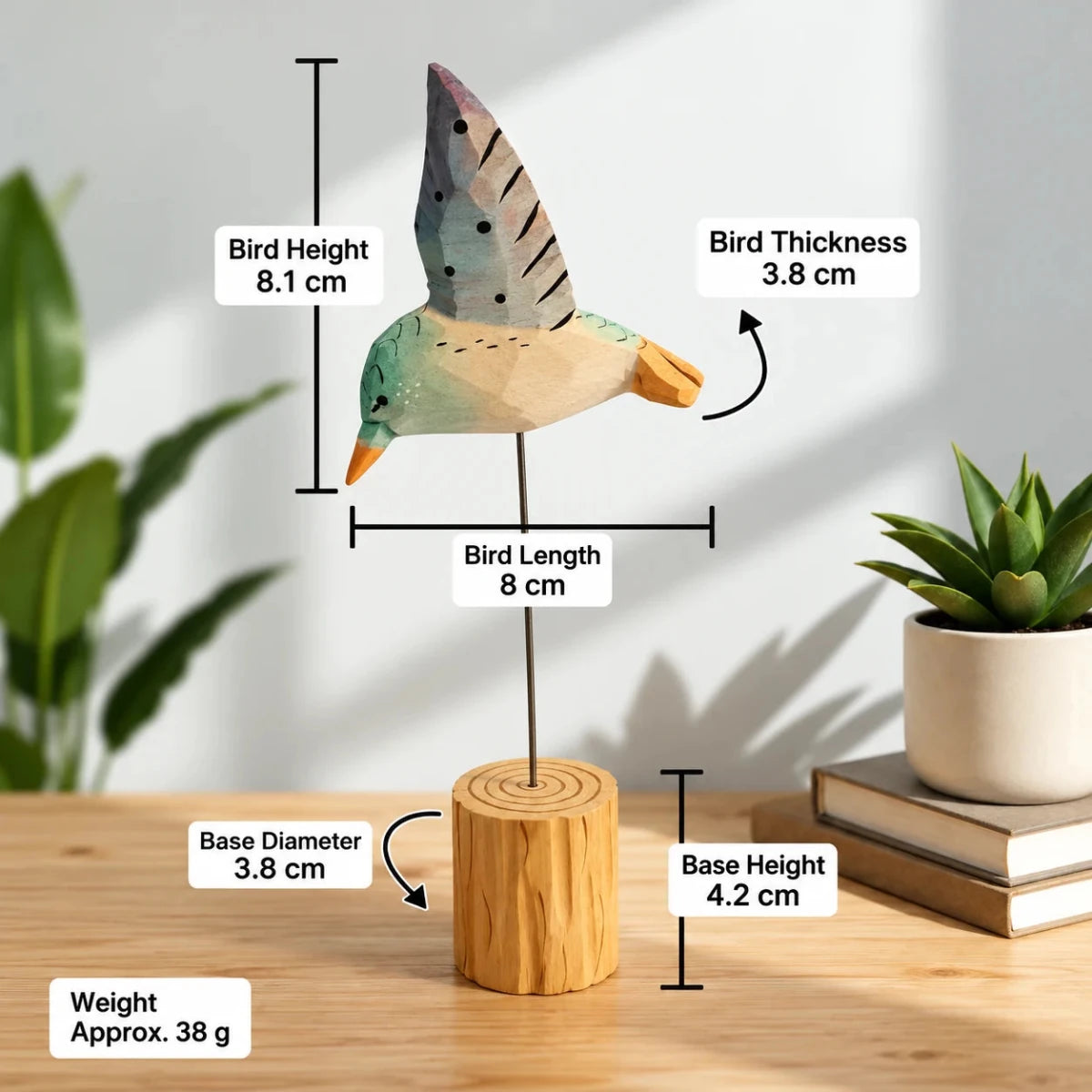 Wooden hummingbird ornament dimensions showing 8 cm length, 8.1 cm height, 3.8 cm thickness, and 38 g weight