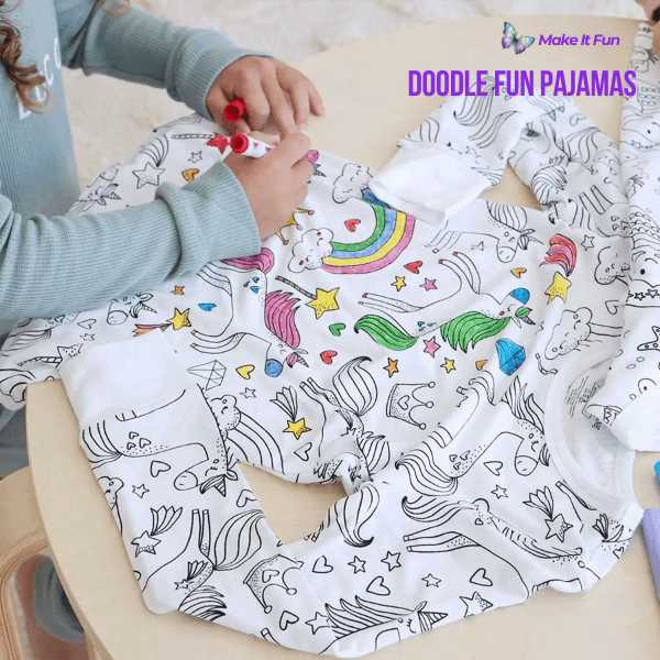 A happy child using fabric markers to color their own short sleeve pajamas