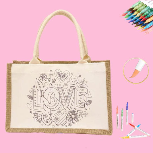 DIY tote bag kit featuring the word 'LOVE' with colorful markers for customization.
