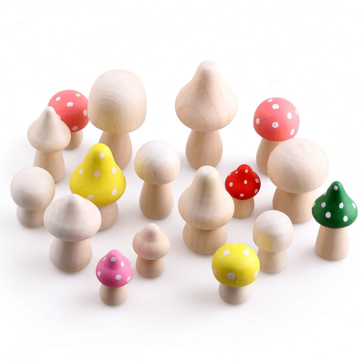 Painted wooden mushrooms displayed as home decor on a windowsill