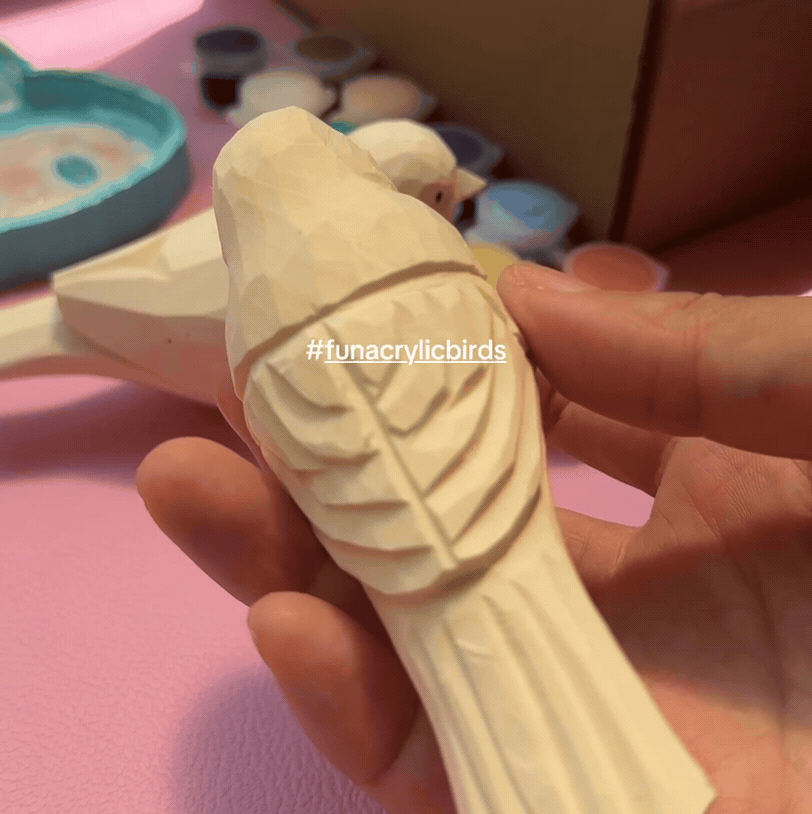 Unfinished hand-carved wooden bird figurine by Funacrylic, made from natural wood for eco-friendly home decor or DIY crafts.