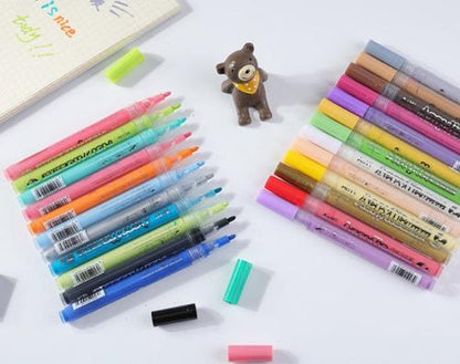 Colorful hard-tip acrylic markers arranged with a cute bear figure on a white background, ideal for DIY projects.