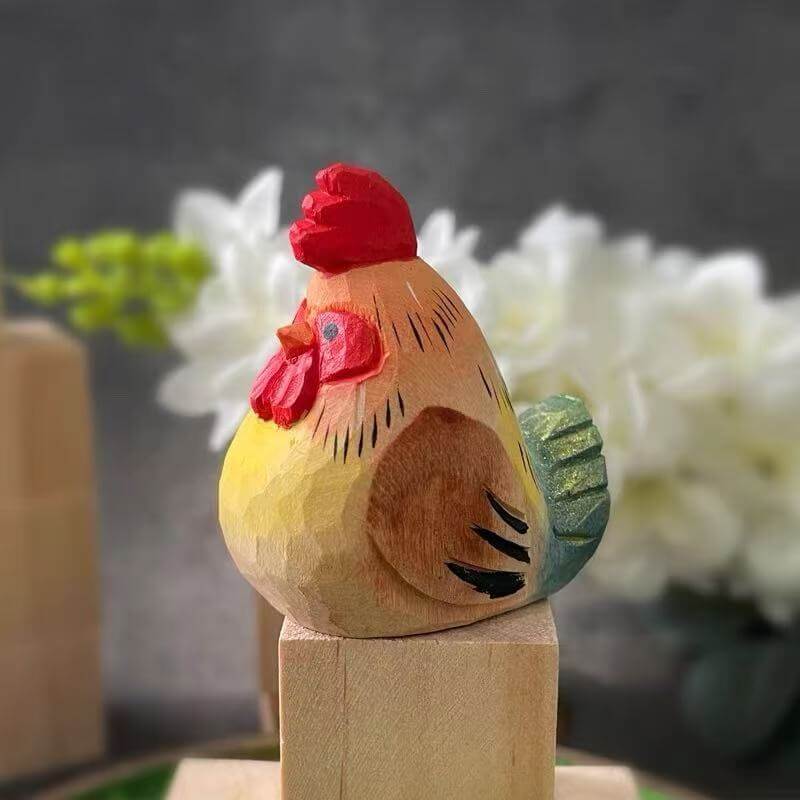 Close-up of a hand-painted wooden hen figurine with colorful details