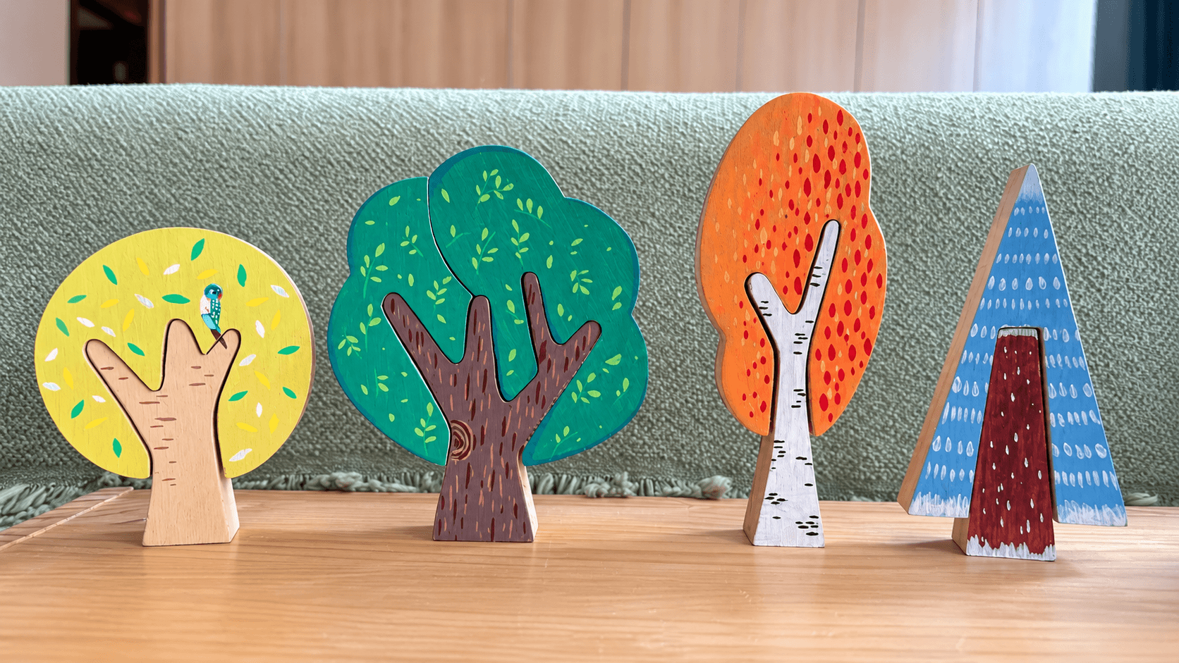 Colorful painted wooden trees styled as home decor