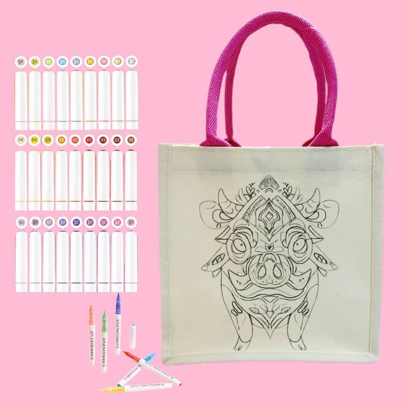 Canvas tote bag featuring a cute pig outline ready for DIY coloring and painting.