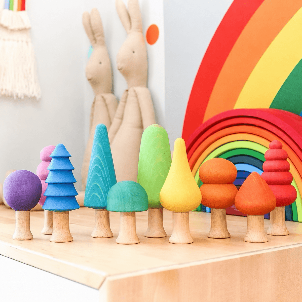 Rainbow-colored painted wooden tree collection