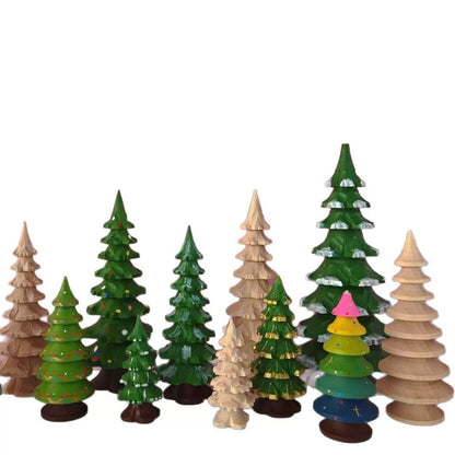 Comparison showing raw wood shapes versus colorful finished painted trees