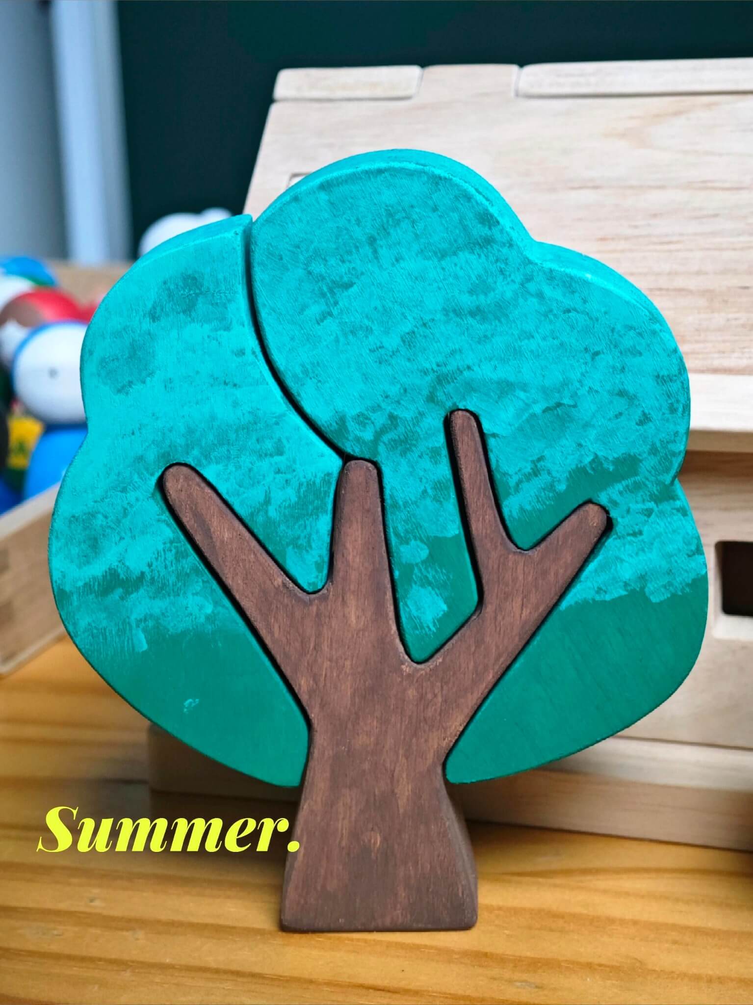 Teal hand-painted wooden tree inspired by summer