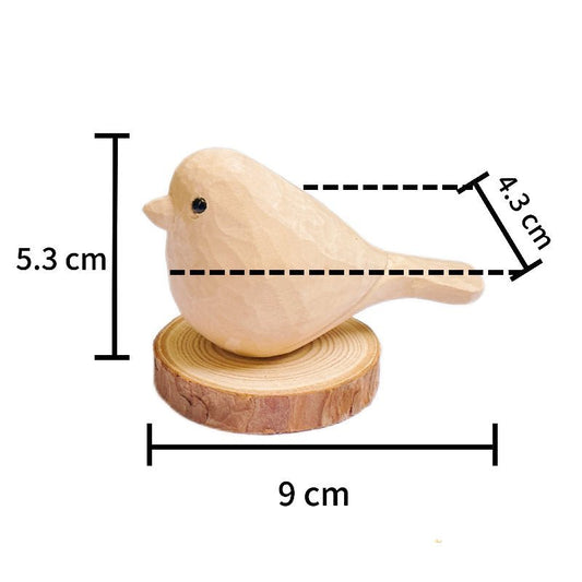 Wooden bird home decor featuring a small bird figurine on a round wooden base, measuring 9 cm in length and 5.3 cm in height.
