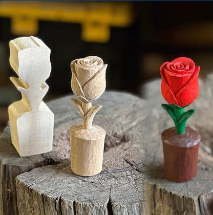 A collection of three beautifully carved wooden flower sculptures showcasing different styles.
