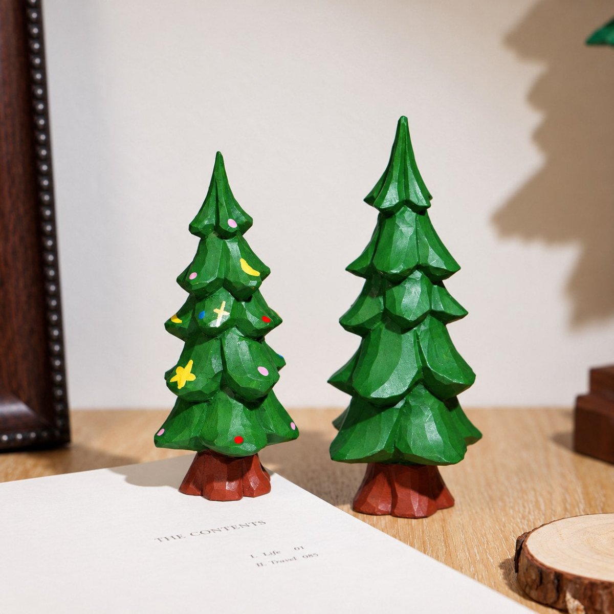 Hand-carved wooden Christmas tree figurine displayed as festive tabletop decor