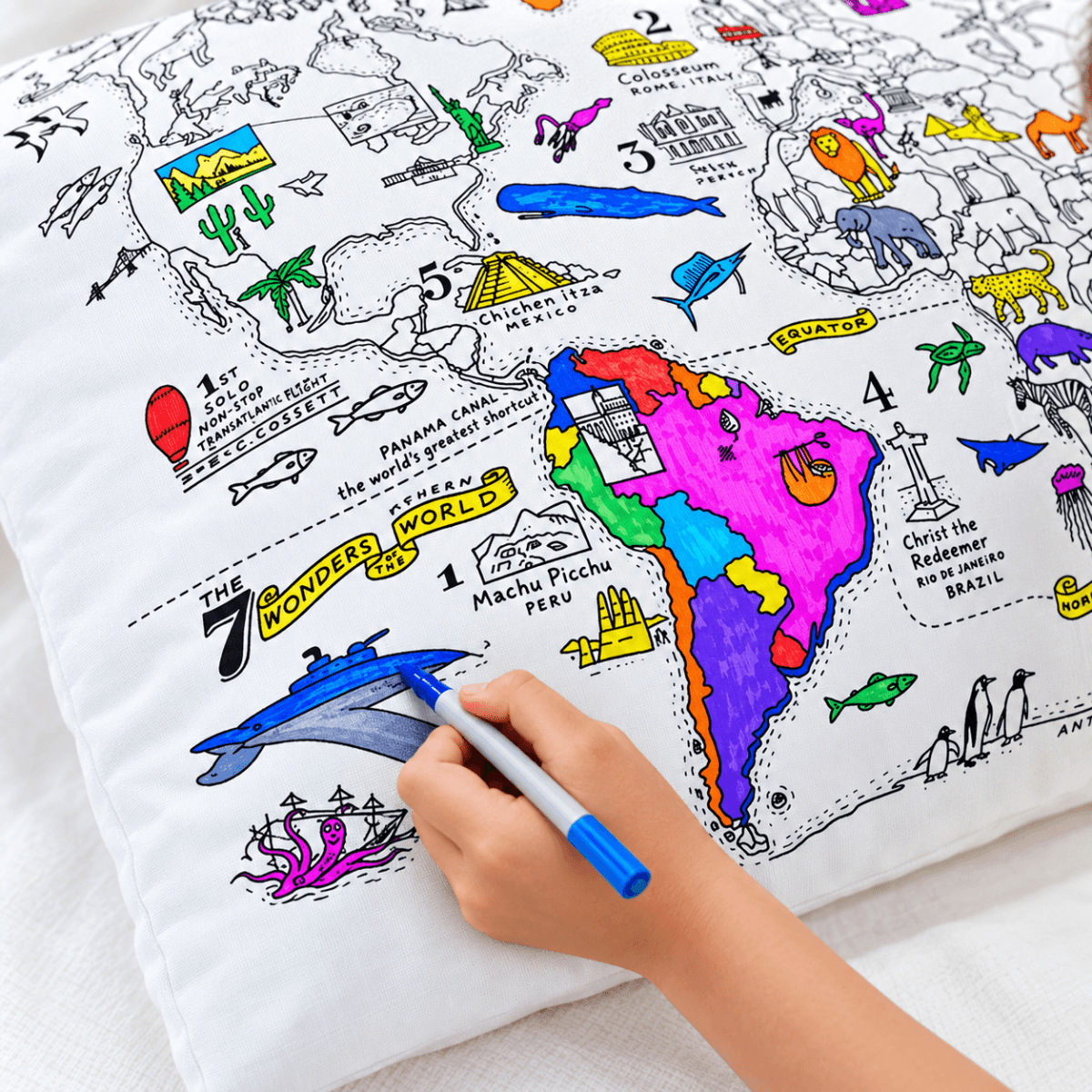 Close-up of a colorful finished world map coloring pillowcase